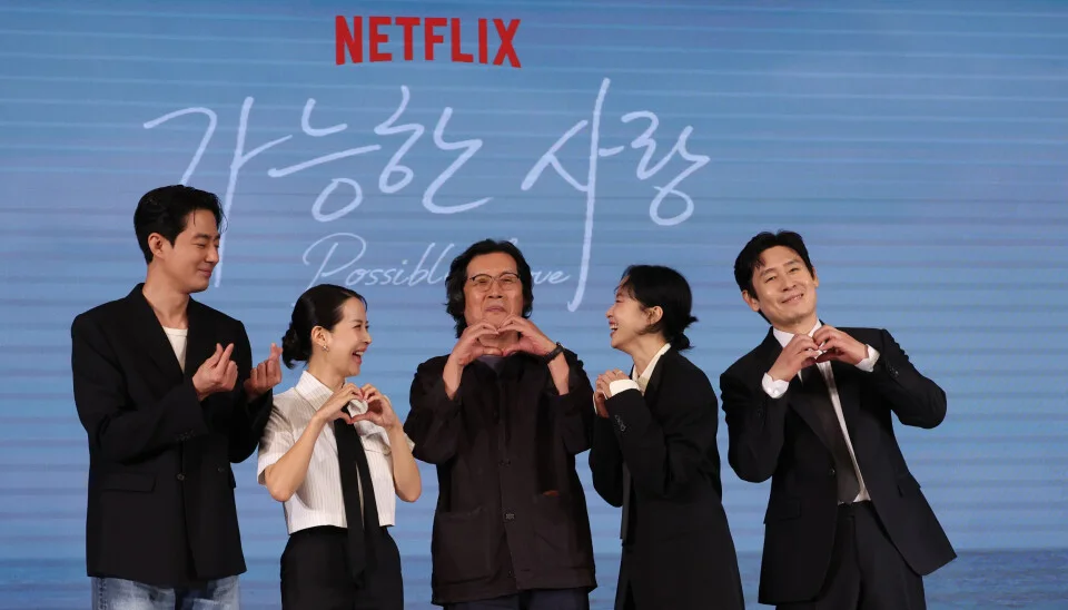 Regisseur Lee Chang-dong mit der Besetzung von Possible Love
